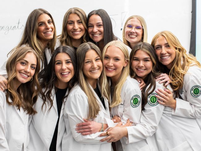 OTD students during white coat ceremony. 