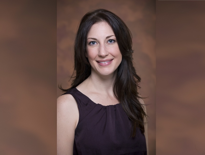 Headshot with brown background