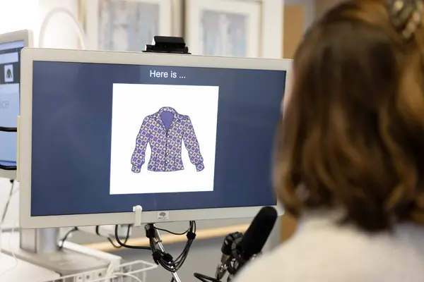 A student in the Rush Center for Brain Mapping looks at a computer screen showing an image of a jacket