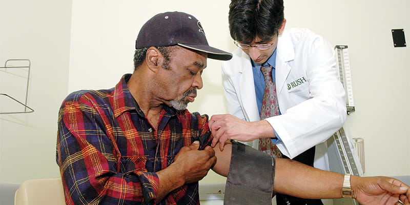 College of Nursing faculty member treats a patient