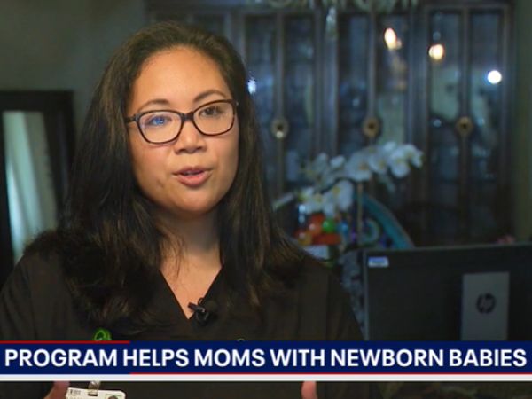 Still from television news broadcast showing a nurse being interviewed, with a chyron reading Program Helps Moms with Newborn Babies