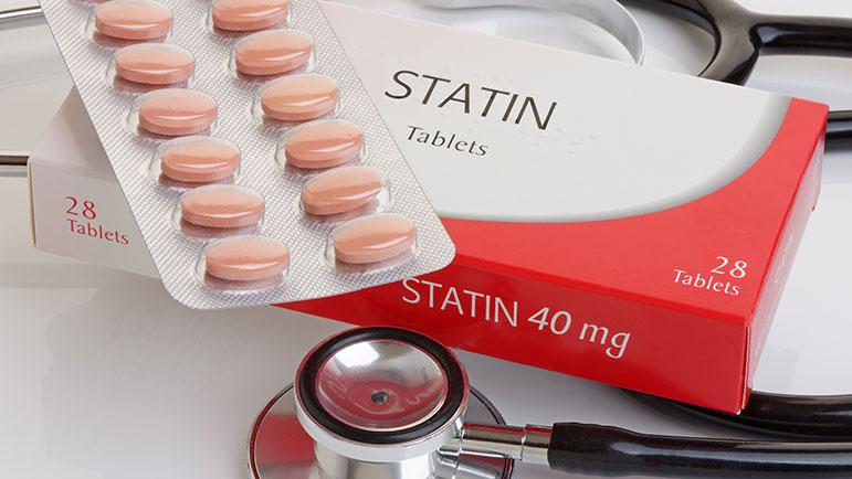 Statin tablets and stethoscope