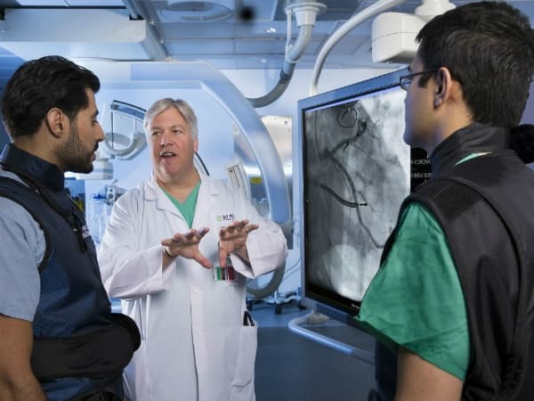 Rush Medical College faculty member workingwith students