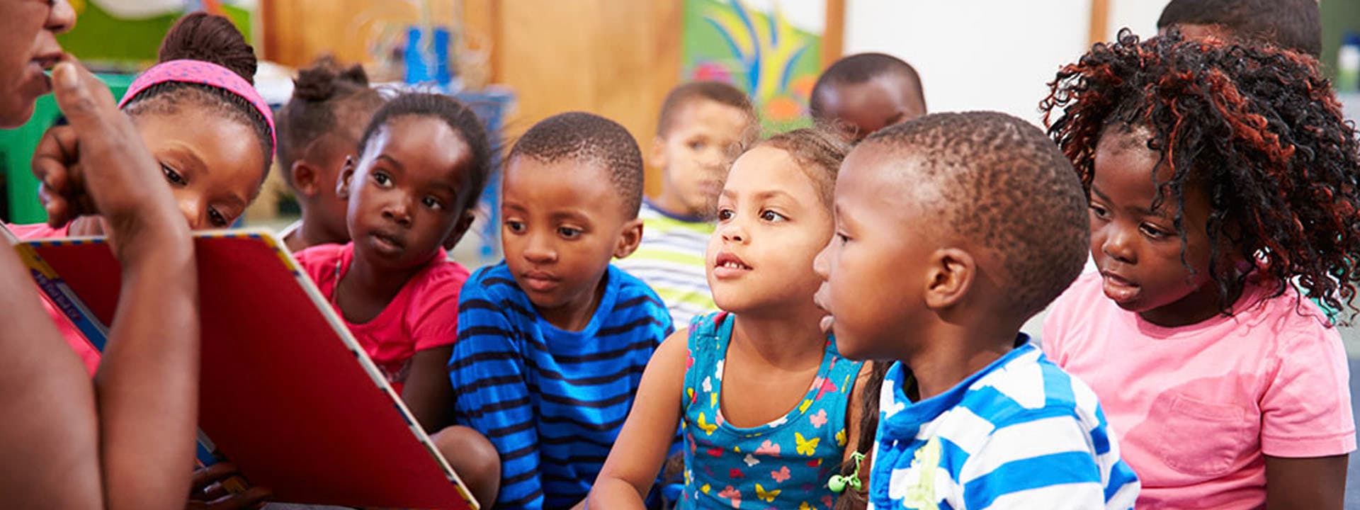 Children listening to a teacher read