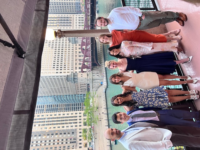 Psychiatry residents posing in front of the Chicago River.