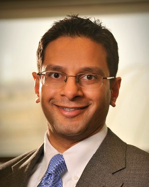 A portrait of Dr. Deepak Patel.