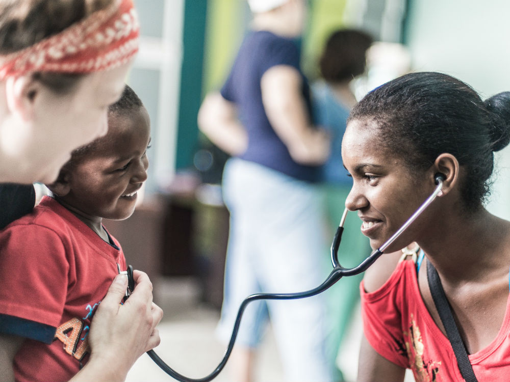 A volunteer with a patient