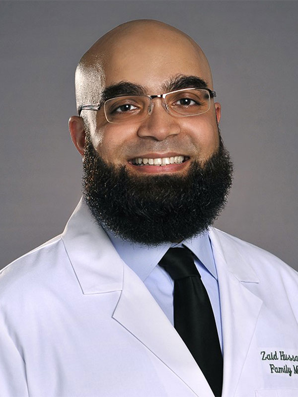 A portrait of Dr. Zaid Hussain.