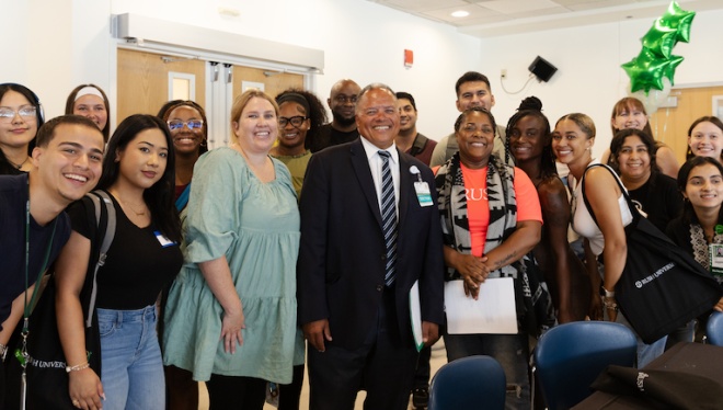 Rush University President Robert S.D. Higgins, MD, MSHA, takes part in a student onboarding fair.