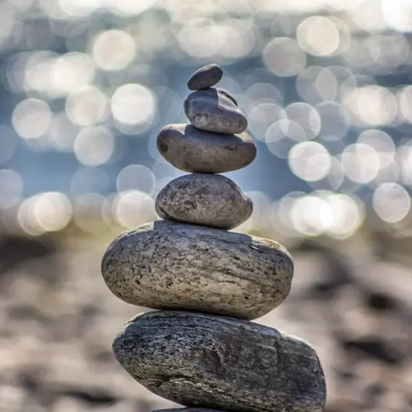 Rocks stacked vertically on the seashore