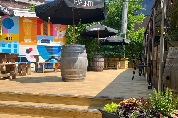 Umbrellas and colorful murals on a patio