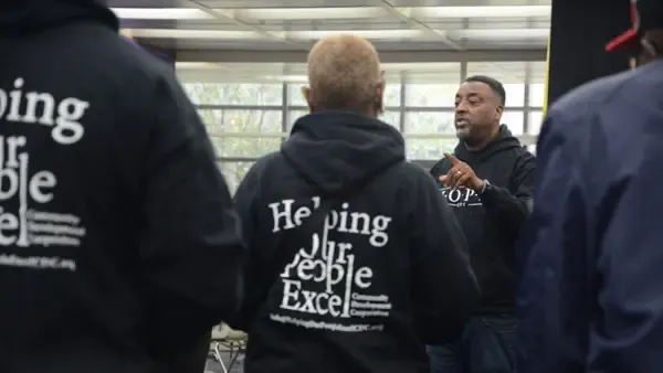 A person talking to a group