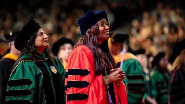 Faculty members wearing academic regalia