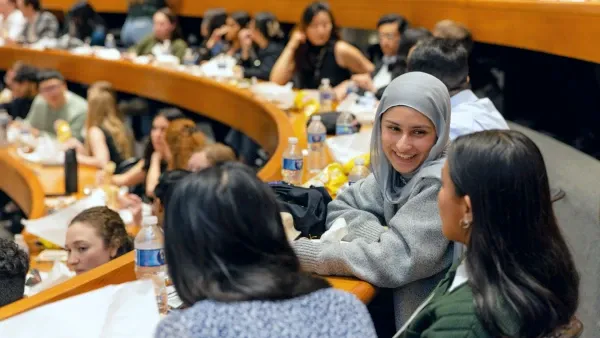 Students talking in a lecture hall