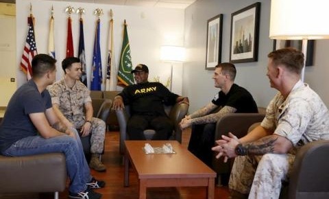 A group of veterans seated in conversation