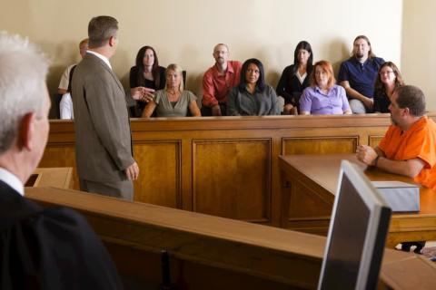 A lawyer addressing a jury