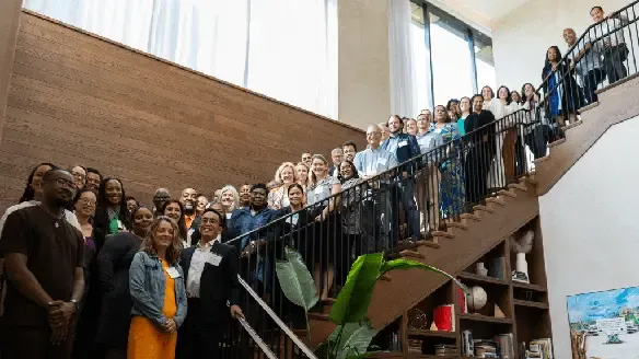 The attendees of the C3EN Third Annual Meeting standing on a staircase