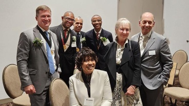 From left to right: James Joseph Conners, MD, Theodore J. Corbin, MD, John A. Rich, MD, Wrenetha A. Julion, PhD (seated), Philip Omotosho, MD, Mikki Goodman and Larry J. Goodman, MD.