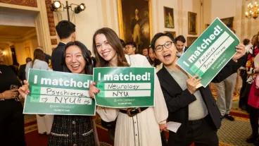 Three smiling students hold up signs that say I Matched!