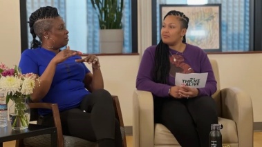 Jazmine Lampkin interviews a guest on her podcast.